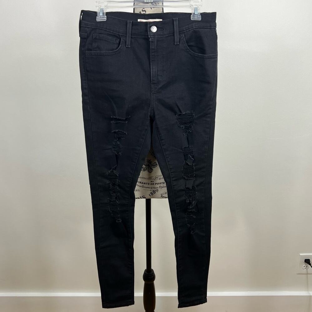 Levi’s woman’s 720 High Rise Super Skinny black distressed jeans with pockets